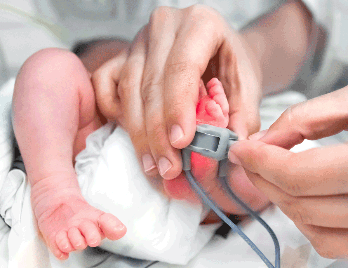 Nurse checking on a NICU baby