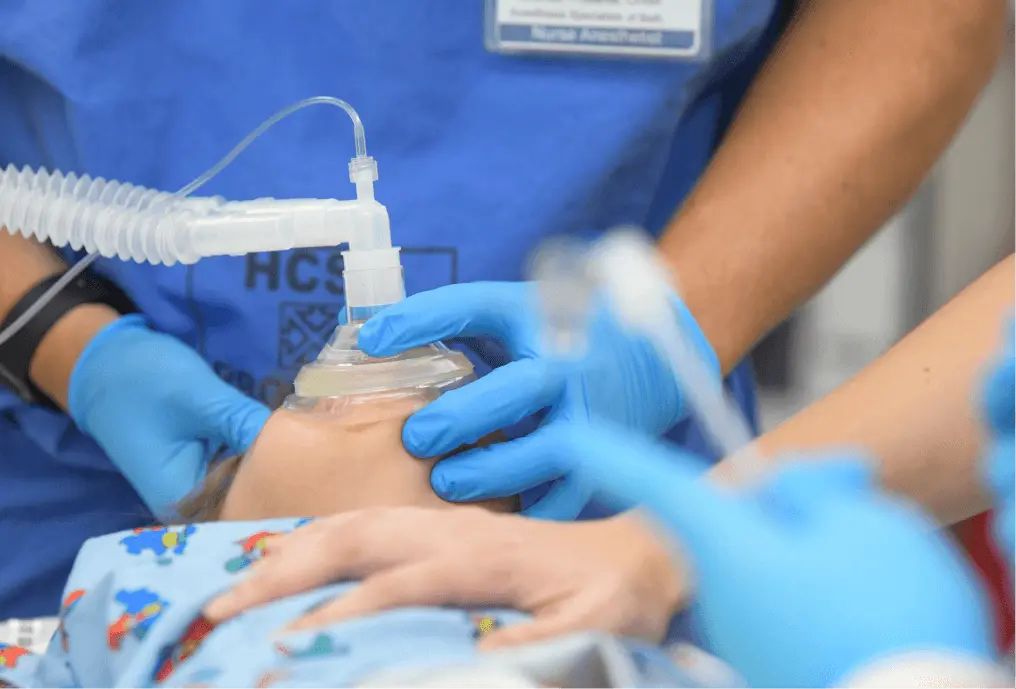 Nurse practicing with a face mask