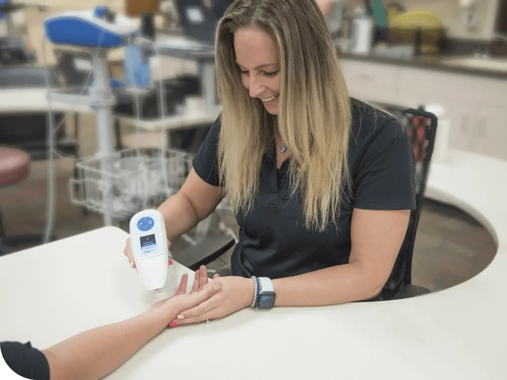 Physical Therapist working with a patient