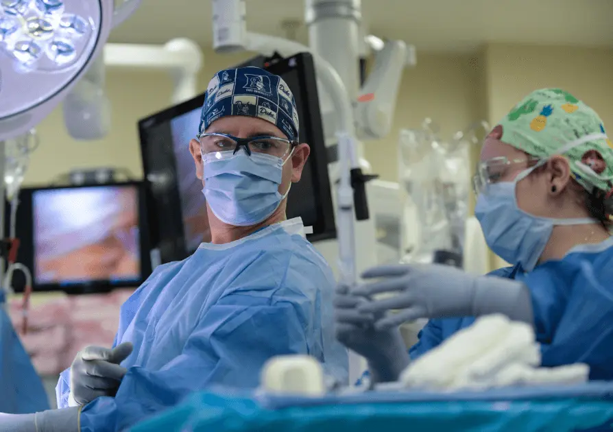 Medical Professionals inside a hospital room