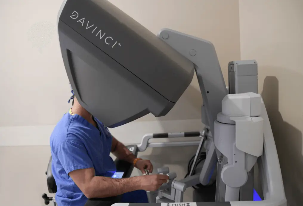 Medical Professional working with a large medical machine