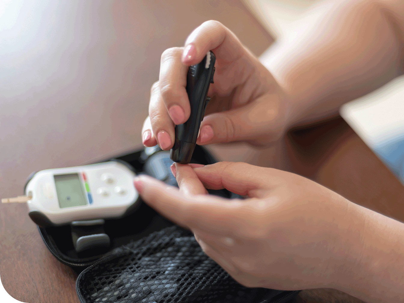 Individual checking their blood sugar