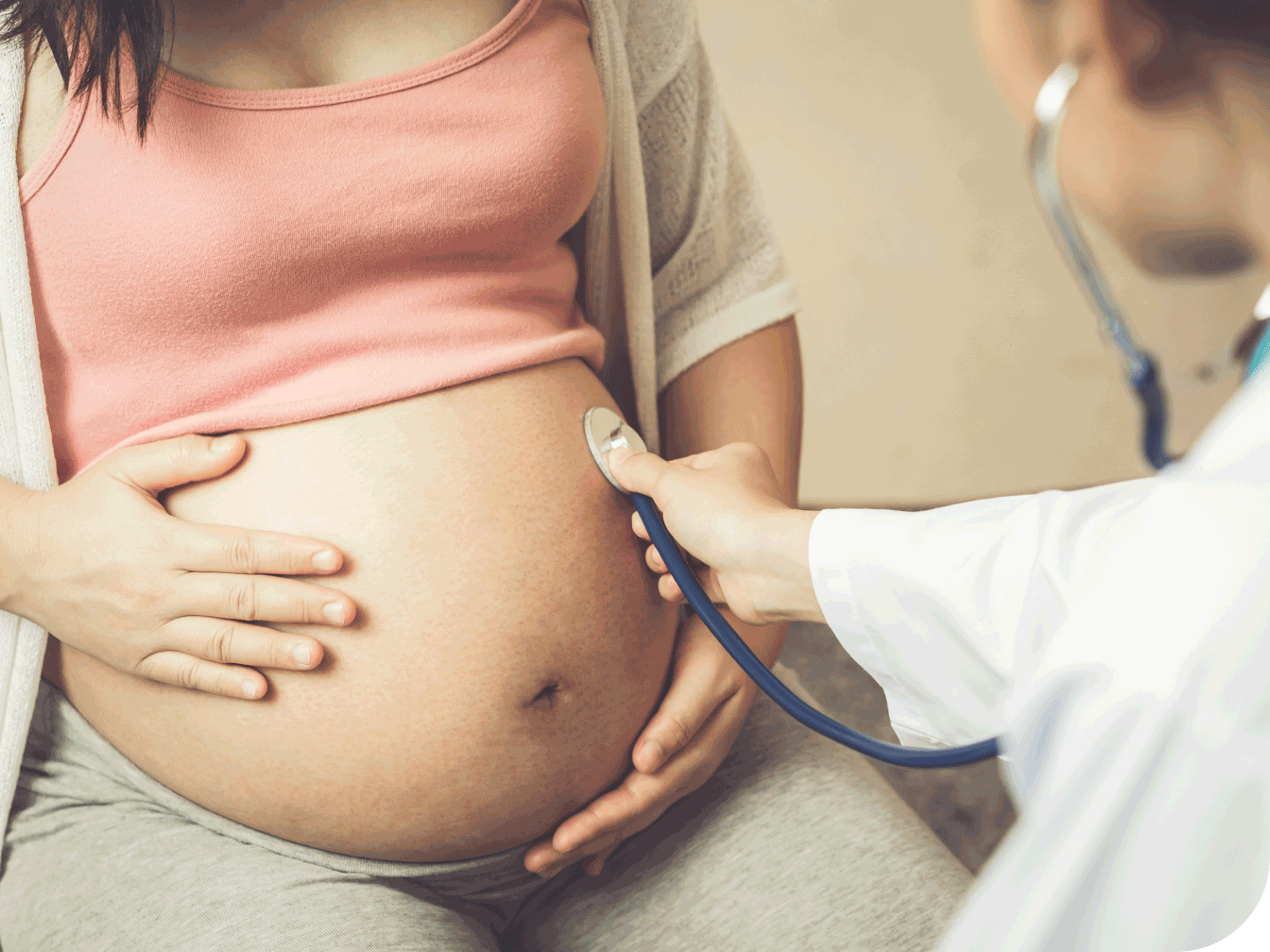 Doctor checking pregnant patient