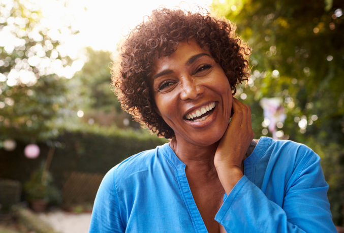 Woman smiling outdoors