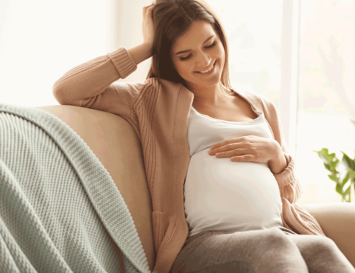 Pregnant woman holding baby bump