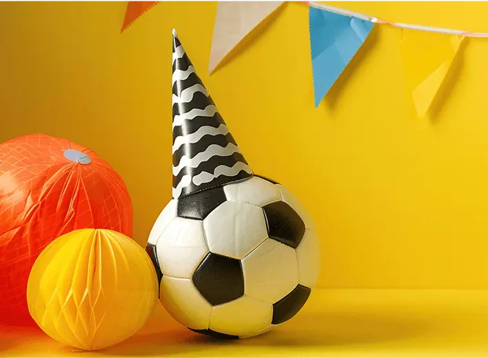 Soccer ball with a birthday hat