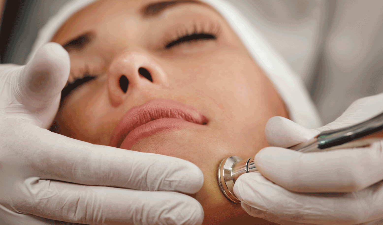 Woman enjoying a spa facial treatment